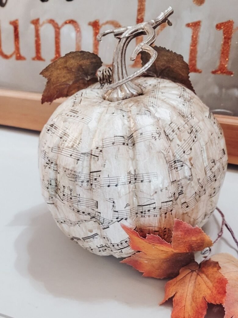 Moondance inspired decoupaged pumpkin with sheet music