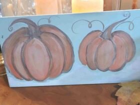 35 finished pumpkins painted on wood