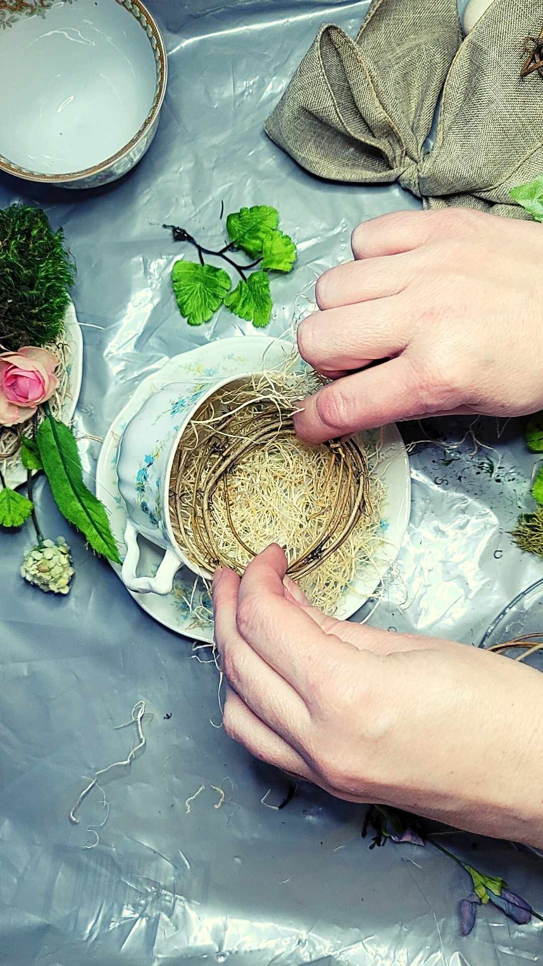 press firmly while glue cures spring teacup nest DIY